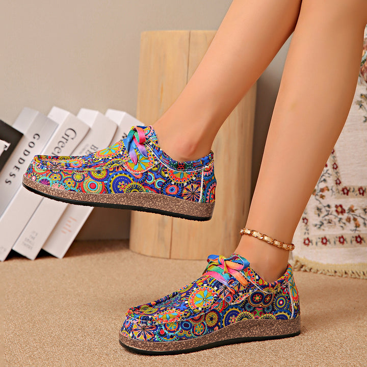 Damen Bequeme Plateau-Slipper im Ethno‑Print mit Korkoptik‑Sohle Drune