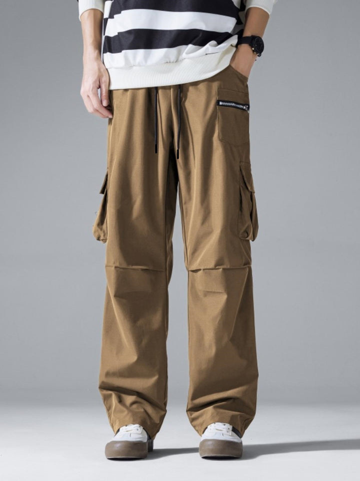 Herren Weite Cargo‑Hose im Baggy‑Cut mit Tunnelzugbund, Zipper‑Tasche & Klappfächern Drune