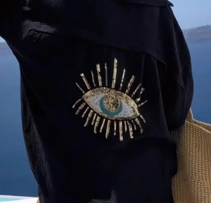 Damen lässige Bluse mit einzigartigem Augenmotiv und gestickten Akzenten Drune