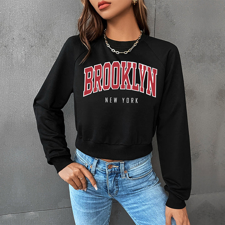 Damen Cropped College-Sweatshirt mit Rundhalsausschnitt, Raglanärmeln und Brooklyn-Print Drune