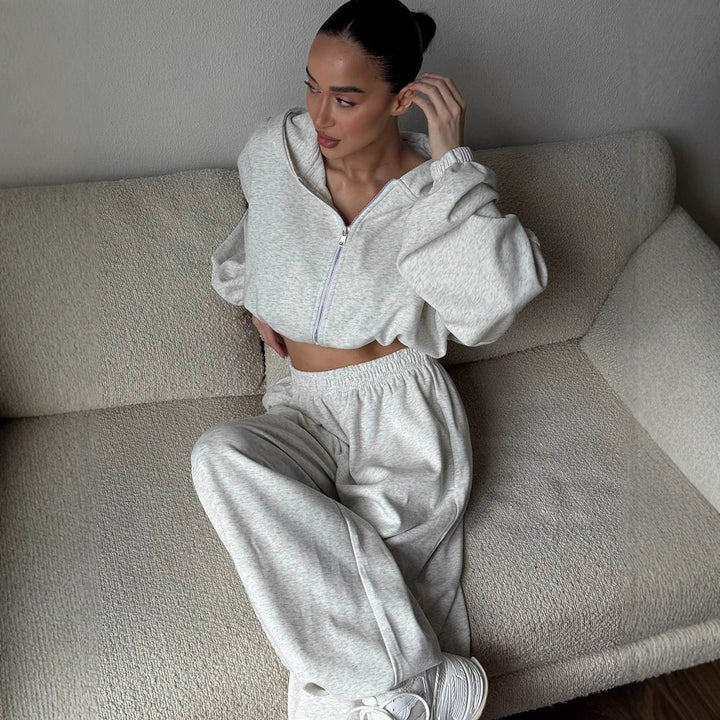 Damen cropped Kapuzen-Zipjacke mit Ballonärmeln und hochgeschnittener weiter Sweatpants-Set Drune