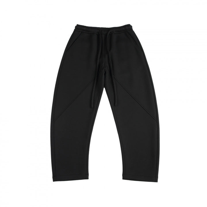 Unisex Weite Tech-Jogginghose mit diagonalem Nahtdesign, Elastikbund und Tunnelzug Drune