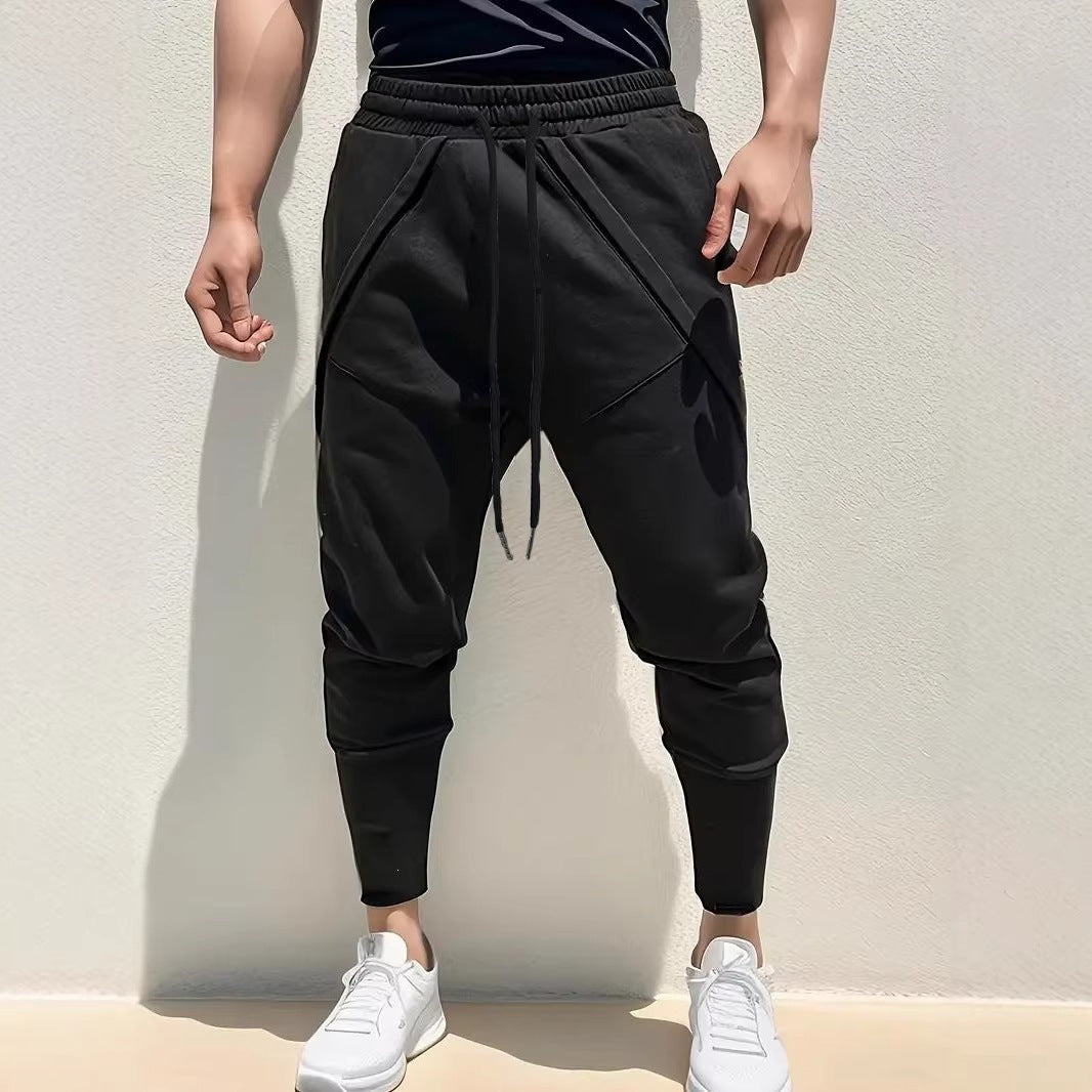 Herren Tapered-Jogginghose mit tiefem Schritt, elastischem Bund & diagonalgesetzten Taschen Drune