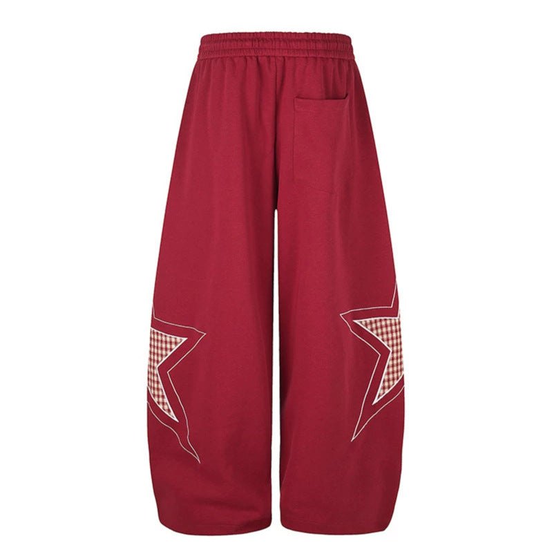 Damen weite Palazzo-Sweathose mit Stern-Applikationen und Karo‑Einsätzen Drune