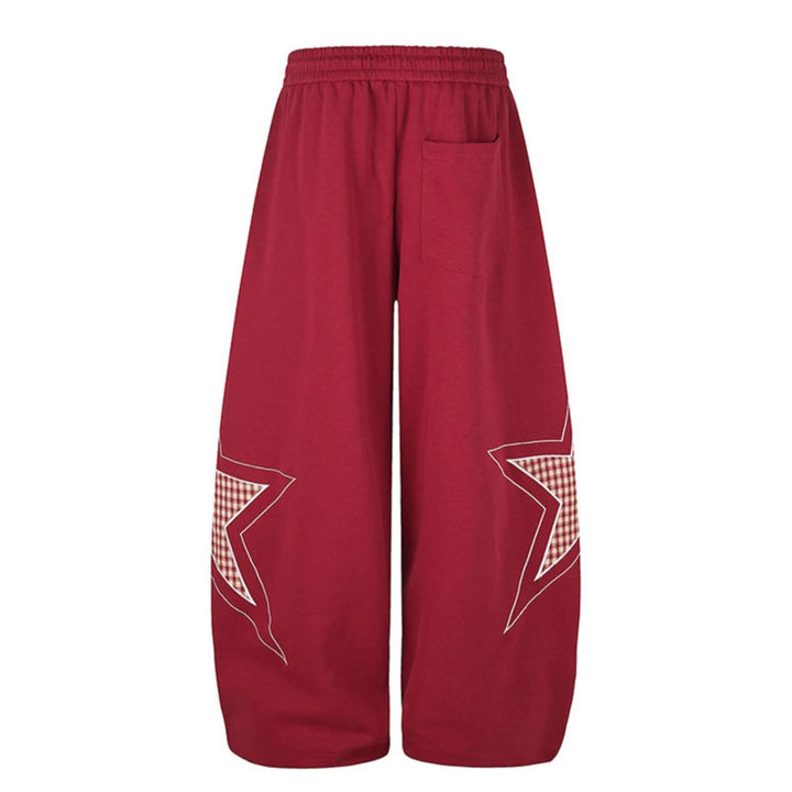Damen weite Palazzo-Sweathose mit Stern-Applikationen und Karo‑Einsätzen Drune