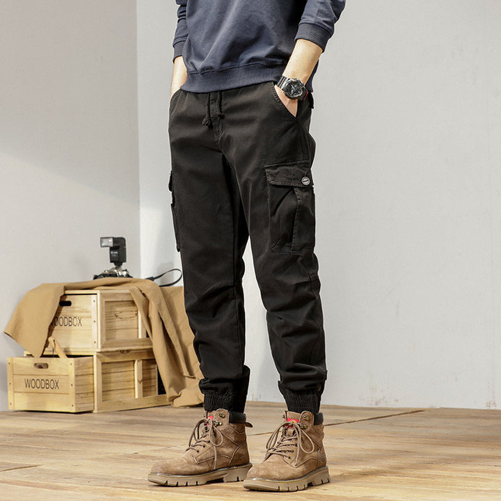 Herren Tapered Cargo-Jogger aus robustem Twill mit Tunnelzugbund, aufgesetzten Klappentaschen und gerippten Knöcheln Drune