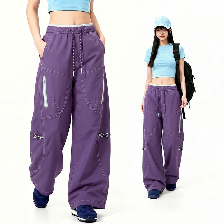 Damen Oversize Tech-Loungehose mit Kontrastnähten, reflektierenden Reißverschlusstaschen & Kordelbund Drune