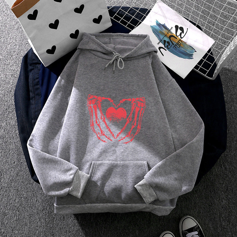 Damen nan stylischer Kapuzenpullover mit Skeletthand Herzmotiv und Kängurutasche Drune