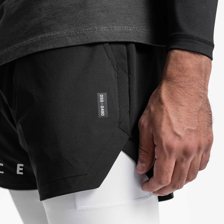 Drune | Doppellagige Shorts mit Tasche