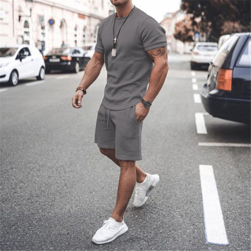 Herren nan figurbetontes Kurzarmshirt mit verstärkter Schulternaht und elastischer Kordelzug-Bermuda aus Stretchjersey Drune