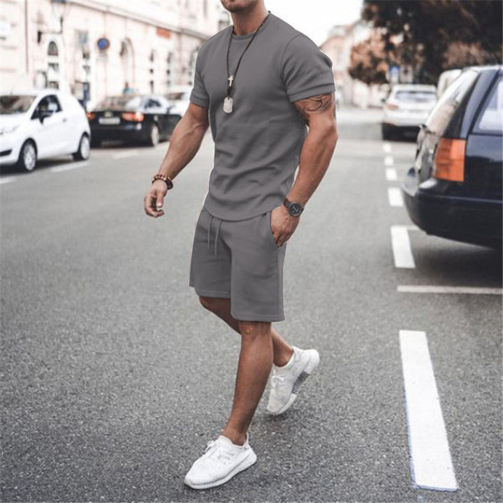 Herren nan figurbetontes Kurzarmshirt mit verstärkter Schulternaht und elastischer Kordelzug-Bermuda aus Stretchjersey Drune
