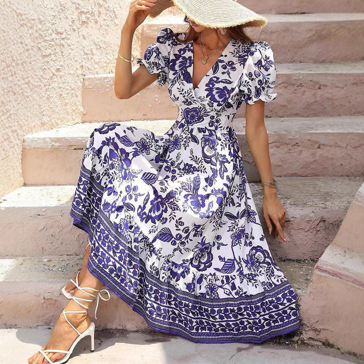 Damen nan tailliertes Boho-Maxikleid mit Wickeloptik V-Ausschnitt Puffärmeln und Bordüren-Stufenrock Drune