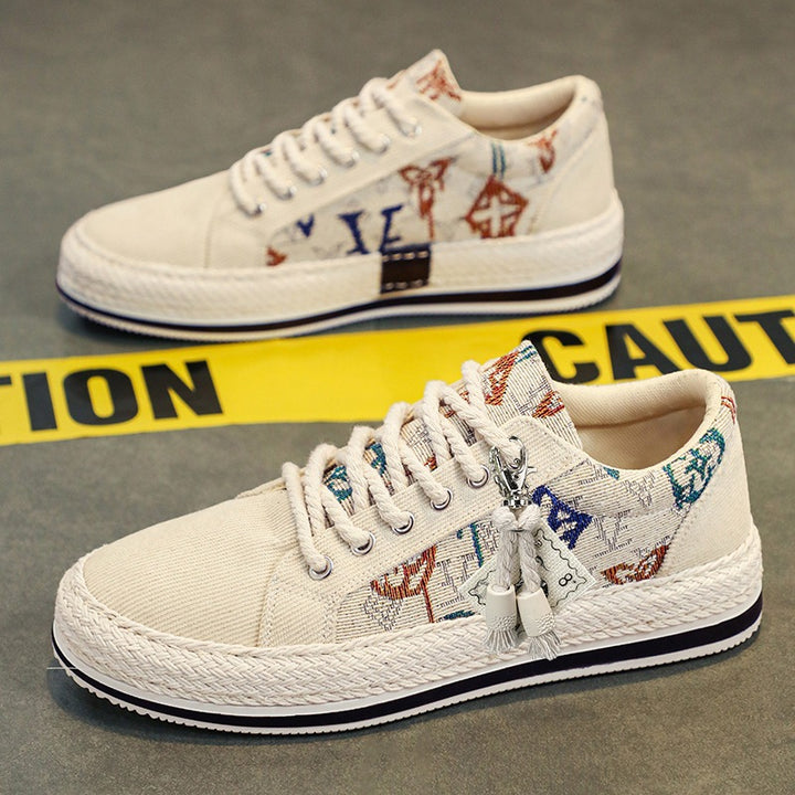 Damen bestickte Canvas‑Sneaker mit Quastenanhänger und geflochtener Plateausohle Drune