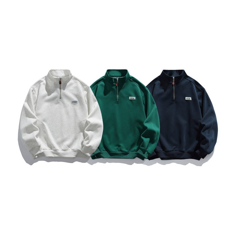 Unisex Halbzip-Sweatshirt mit Stehkragen, Raglanärmeln und minimalistischer Brustpatch Drune