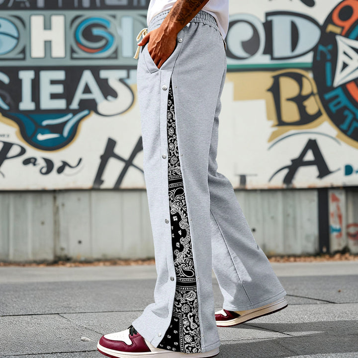 Herren nan weit geschnittene Snap-Front Jogginghose mit Paisley-Seiteneinsatz und elastischem Komfortbund Drune