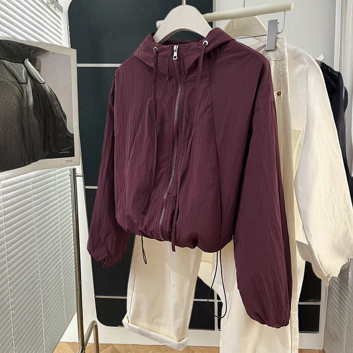 Damen nan leichtgewichtige Kapuzen-Übergangsjacke mit Tunnelzugbündchen und Ballonärmeln Drune