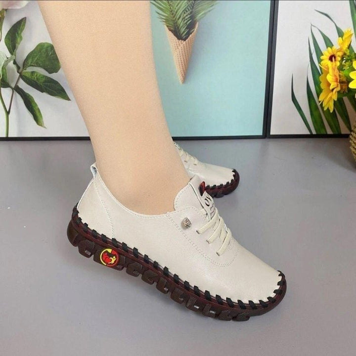 Damen Flexible Lederoptik-Sneaker mit handgenähter Kontrastnaht und profilierter Gummilaufsohle Drune