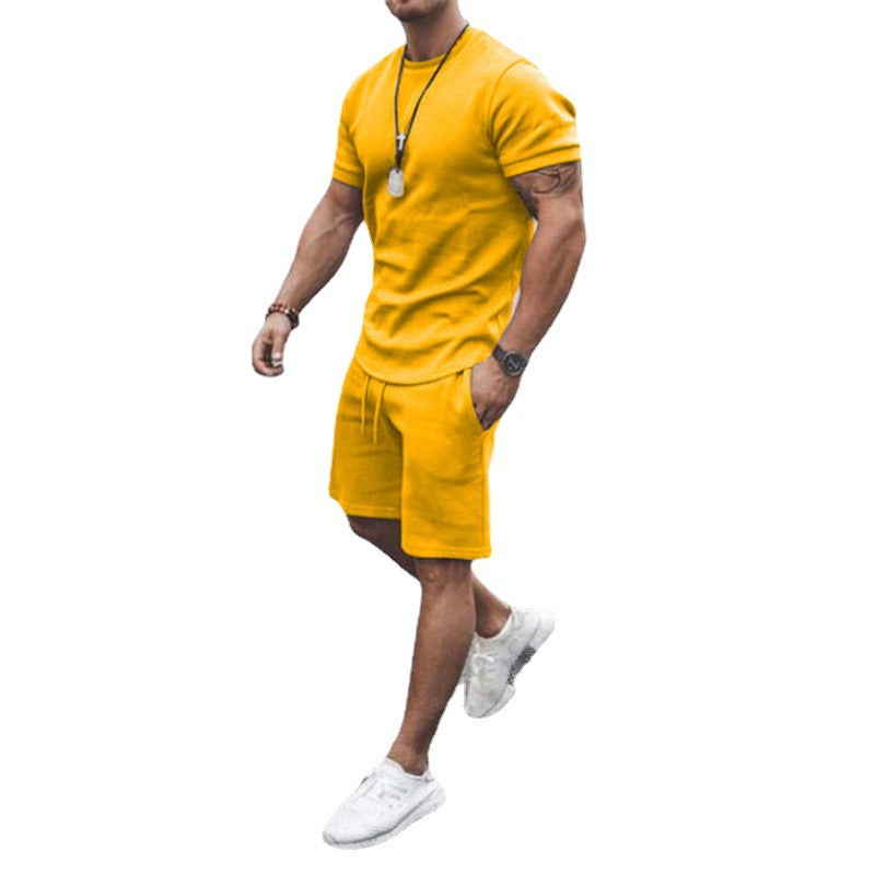 Herren nan figurbetontes Kurzarmshirt mit verstärkter Schulternaht und elastischer Kordelzug-Bermuda aus Stretchjersey Drune
