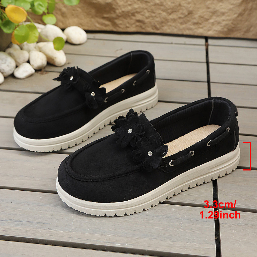 Damen Velours‑Slipper mit Blumenapplikation und profilierter Plateau‑Sohle Drune