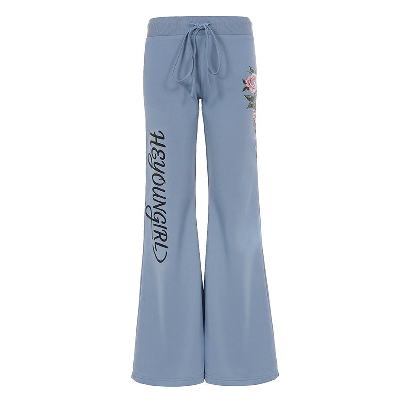 Damen nan ausgestellte Jersey-Sweathose mit Kordelzug, floralem Seitenprint und Statement-Schriftzug Drune
