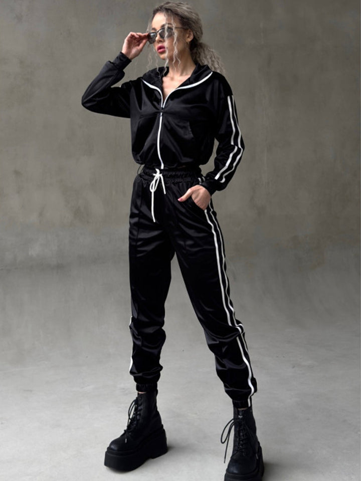 Damen glänzender Satin-Trainingsanzug mit Kontraststreifen, Reißverschlussjacke und Tunnelzughose Drune