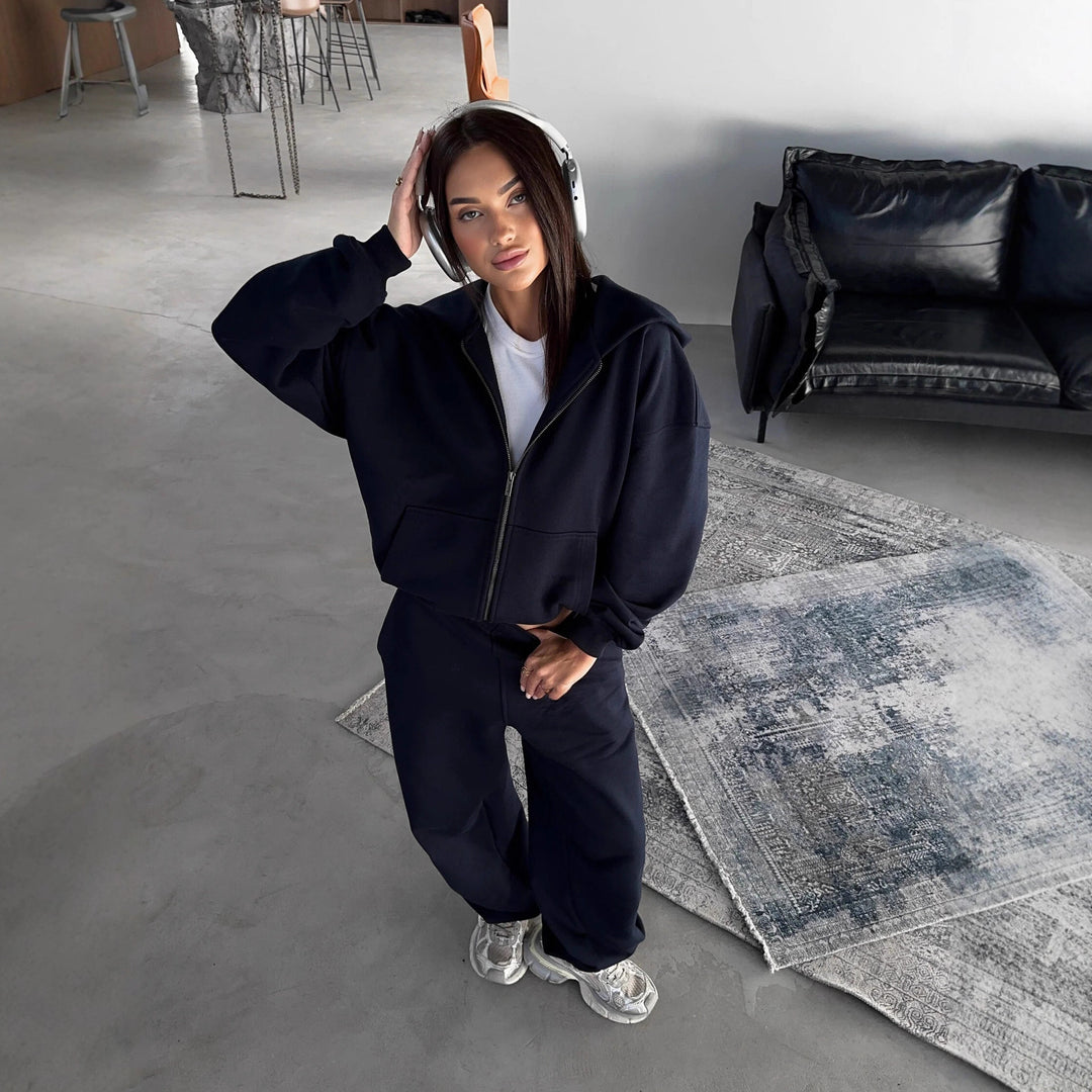 Damen lässiges Zip-Lounge-Set mit übergroßer Kapuzenjacke und taillierter Relax-Jogginghose Drune