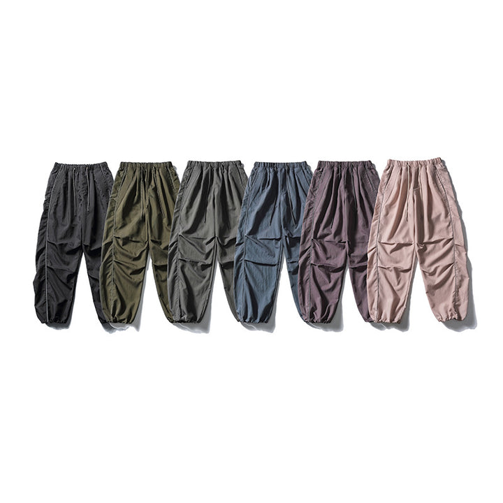 [Herren] weit geschnittene Nylon-Joggerhose im Utility-Stil mit Tunnelzugbund, Kontrastpaspel und elastischen Knöchelabschlüssen Drune