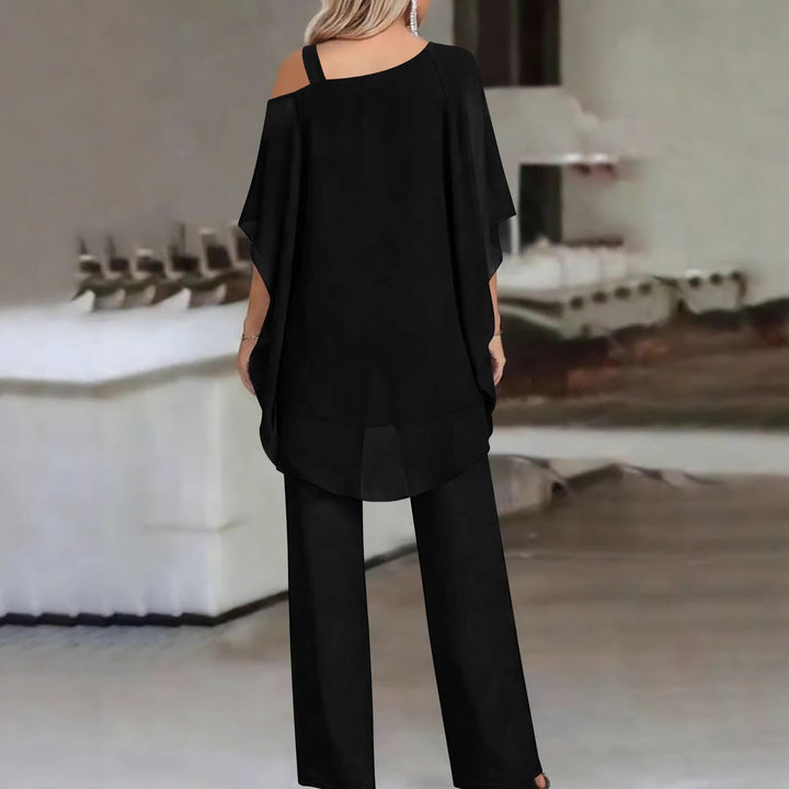 Damen Lagenbluse mit One-Shoulder-Trägern und asymmetrischem Volant-Saum Drune