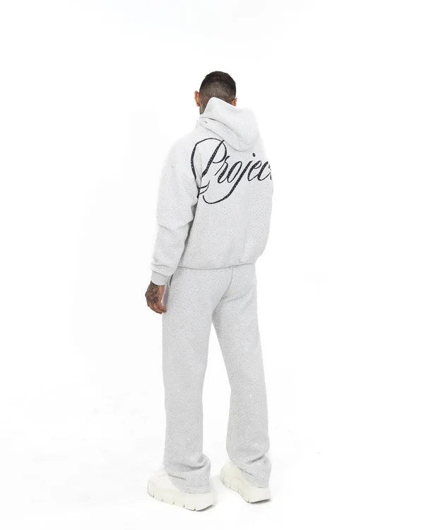 Herren nan weite Komforthose mit geradem Bein, elastischem Kordelbund, dezenter Schriftzug-Stickerei und feiner Sprenkeloptik Drune