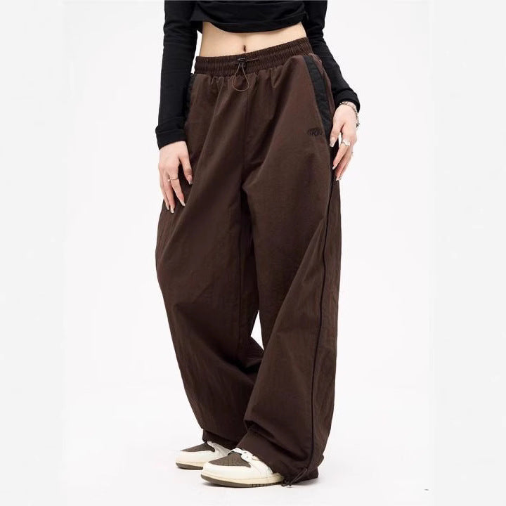 Damen nan weite Trackhose mit Kontrastpaspel, elastischem Bund und Oversize-Schnitt Drune