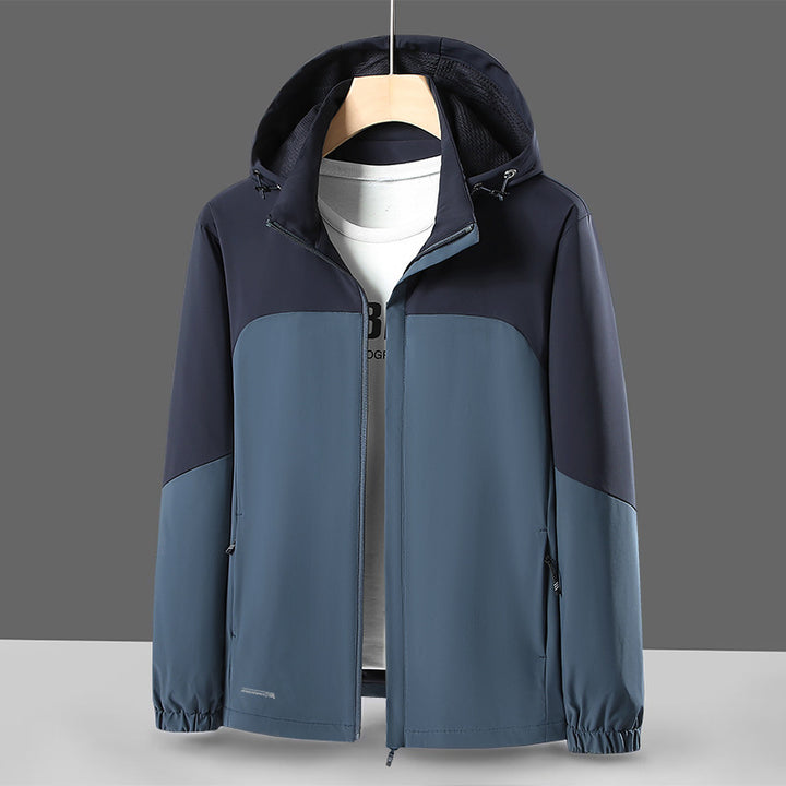 Herren Leichte Softshell-Windjacke mit Kapuze, wasserabweisender Membran und Reißverschlusstaschen Drune
