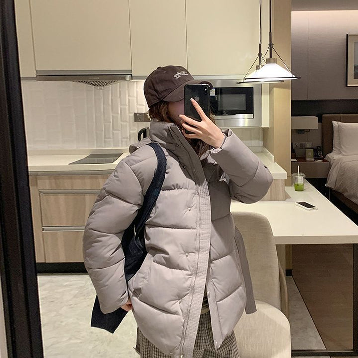 Damen gesteppte Winterjacke mit hohem Kragen und seitlichen Taschen
