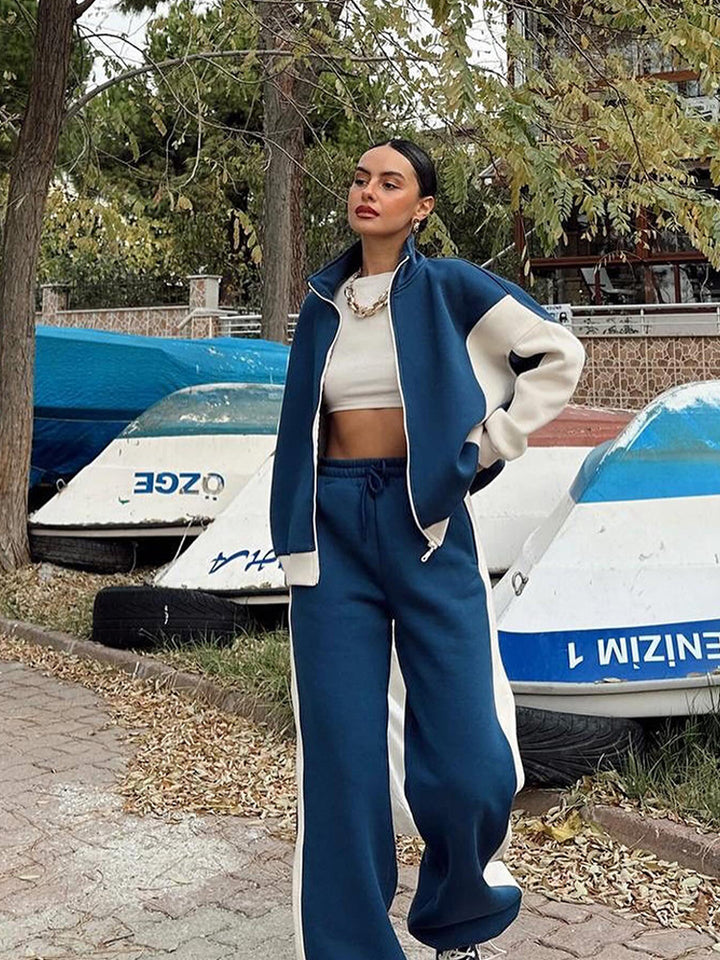 Damen athletisches Zweiteiler-Set aus strukturiertem Sweatstoff mit gekürzter Reißverschlussjacke und hochgeschnittener Jogginghose mit weitem Beinverlauf Drune