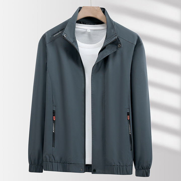Herren Leichte atmungsaktive Windjacke mit Stehkragen, Reißverschlusstaschen und Kordelzug Saum Drune