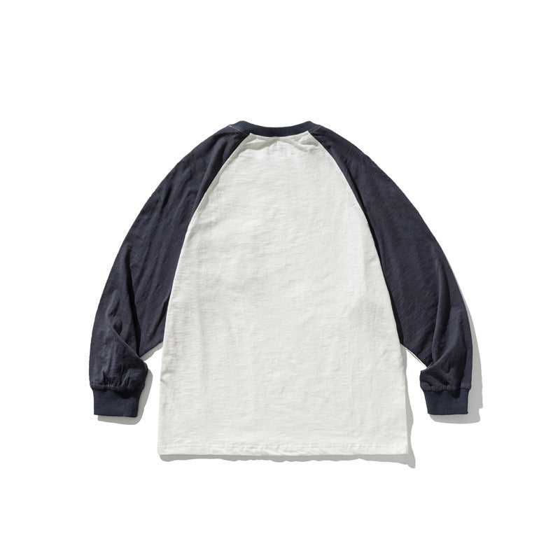 Unisex Lässiges Raglan-Longsleeve mit Kontrastärmeln und aufgesetzter Klappentasche Drune
