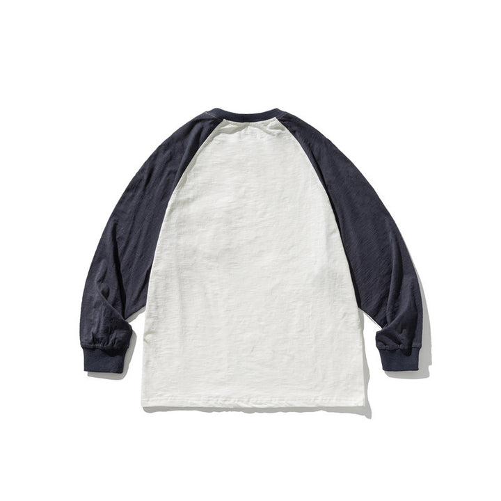 Unisex Lässiges Raglan-Longsleeve mit Kontrastärmeln und aufgesetzter Klappentasche Drune