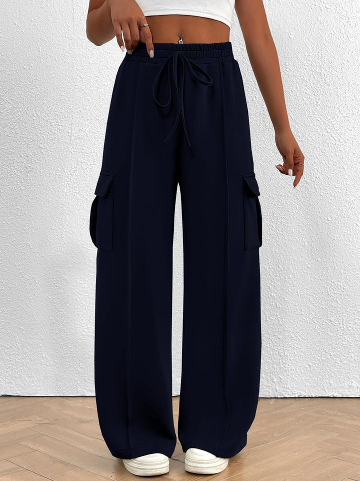 Damen Weite Cargo-Loungehose mit Tunnelzugbund und aufgesetzten Pattentaschen Drune