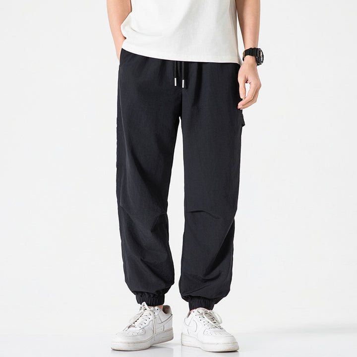 Herren Technische Ripstop-Joggerhose mit Tunnelzug, Knieabnähern und geripptem Knöchelabschluss Drune