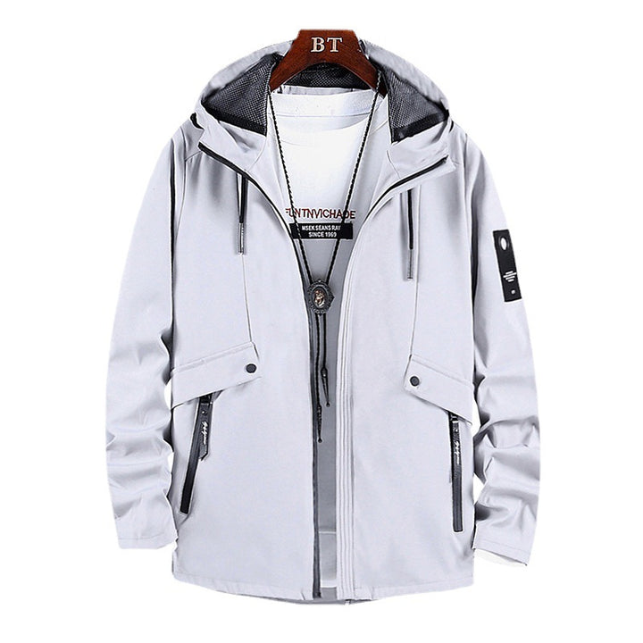 Herren Softshell-Fieldblouson mit Kapuze, verdecktem Zwei-Wege-Reißverschluss und multiplen Utility-Taschen Drune