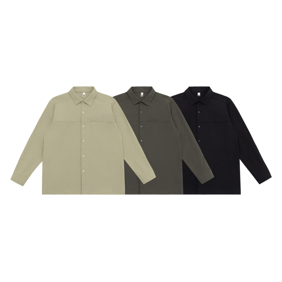 Unisex Longline-Hemdjacke im Boxy-Schnitt aus schwerer Sweatqualität mit verdeckter Druckknopfleiste Drune