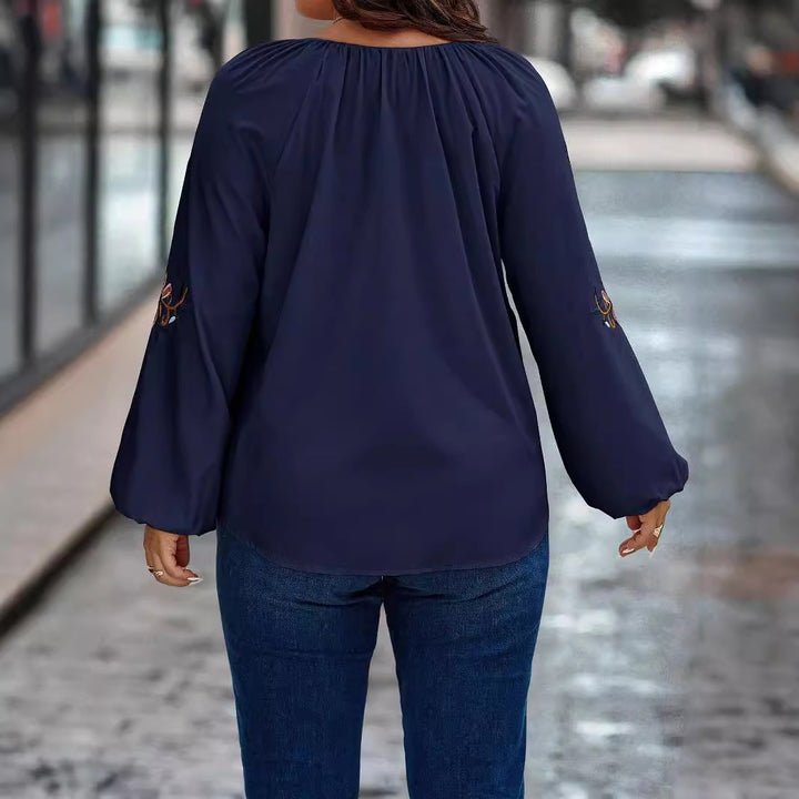 Damen Locker sitzende V-Ausschnitt Bluse mit floraler Stickerei an Ballonärmeln Drune