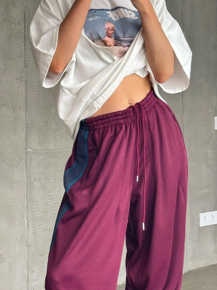 Damen weite Sporthose mit diagonalen Streifen Drune