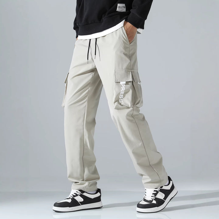 Herren Tapered Cargo-Jogginghose mit elastischem Tunnelzug, multifunktionalen Klapptaschen & ergonomischen Nähten Drune