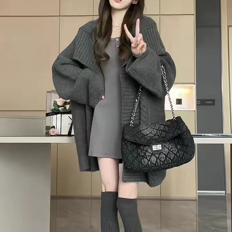 Damen oversized Strickjacke mit voluminösen Ärmeln und strukturierter Oberfläche Drune