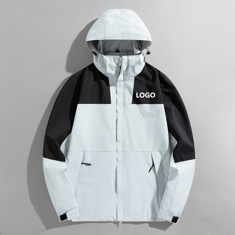 Herren Colorblock Wind- und Wasserabweisende Kapuzenjacke mit atmungsaktiver Softshell-Membran Drune