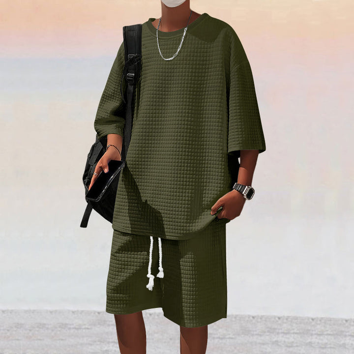 Herren nan quadratstruktur Freizeitset mit oversized Rundhalsshirt und knielangen Relax-Shorts Drune