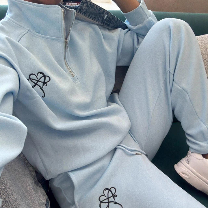 Damen sportlicher Sweater mit halbem Reißverschluss und kontrastierendem Logo Drune