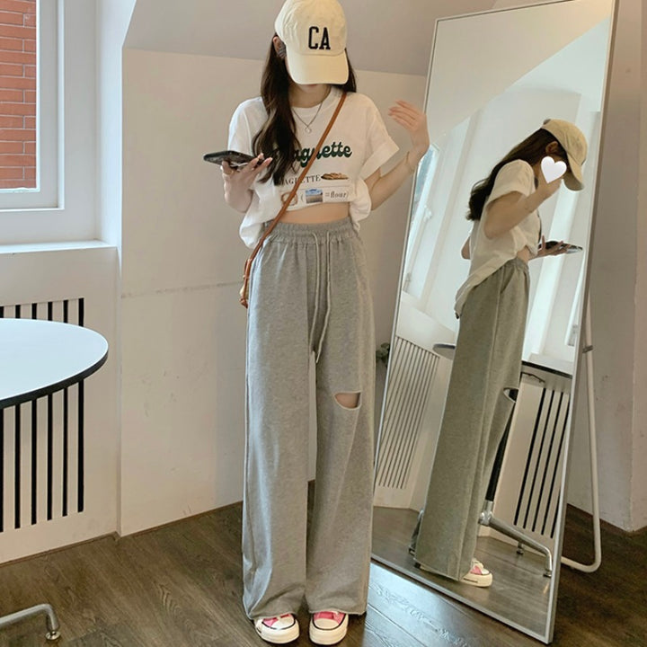 Damen lässige weit geschnittene Sweatpants mit modischem Cut-Out und elastischem Bund