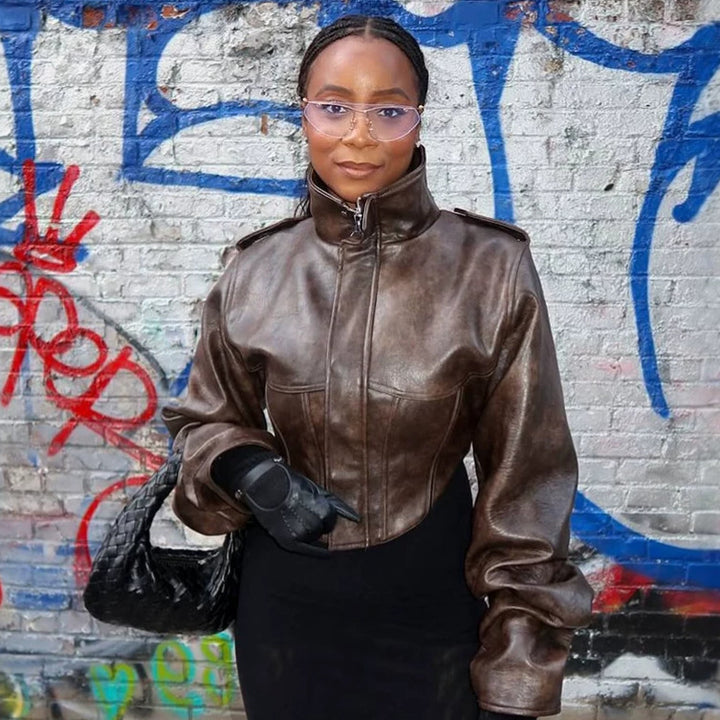 Damen Cropped Kunstleder‑Corsagenjacke mit hohem Stehkragen und verlängerten Ärmeln Drune
