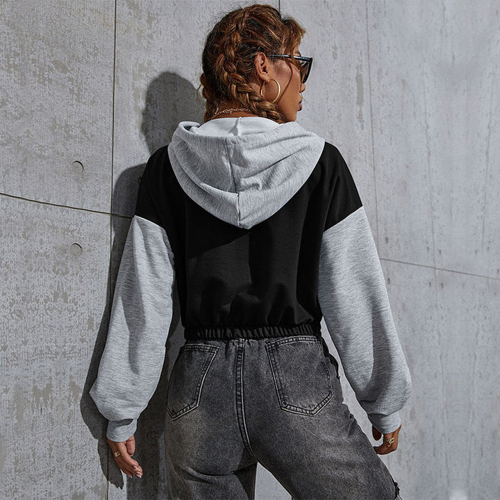 Damen Cropped Hoodie mit Kontrastärmeln, elastischem Saum und schmelzendem Smiley-Print Drune